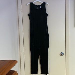 It’s black with a velour material and a glitter black attached belt